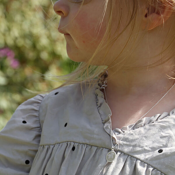 Lykkeliten, sølv/ hvit perlemor Lykkeliten, sølv/ hvit perlemor, Th. Marthinsen